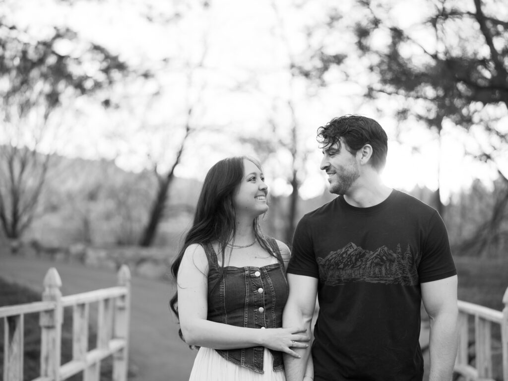 Close up shot of couple walking and looking at each other captured by a Reno photographer in a couples session
